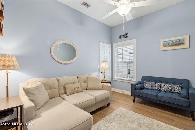 1743 Azalea St, Fernandina Beach, FL 32034 - living area with ceiling fan, wood finished floors, and baseboards