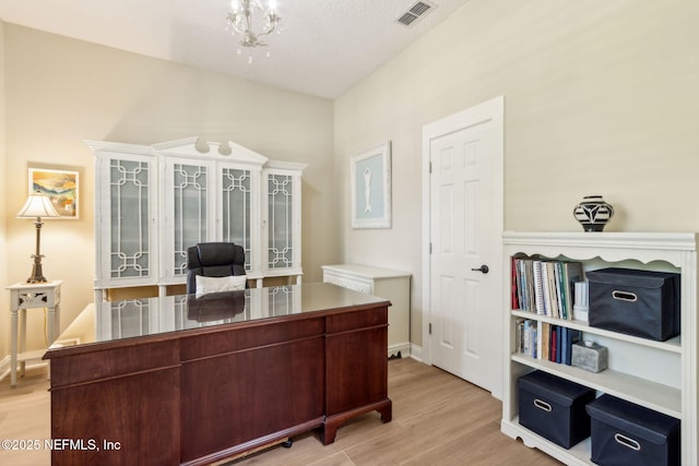 1743 Azalea St, Fernandina Beach, FL 32034 - office with light wood finished floors and a chandelier