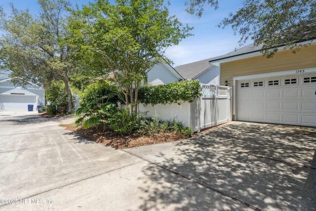 1743 Azalea St, Fernandina Beach, FL 32034 - view of side of property with concrete driveway
