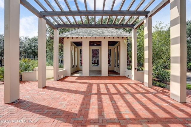 1743 Azalea St, Fernandina Beach, FL 32034 - view of patio featuring a pergola and an outbuilding
