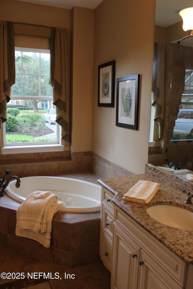 204 Stonewell Dr, Saint Johns, FL 32259 - bathroom with vanity and a garden tub