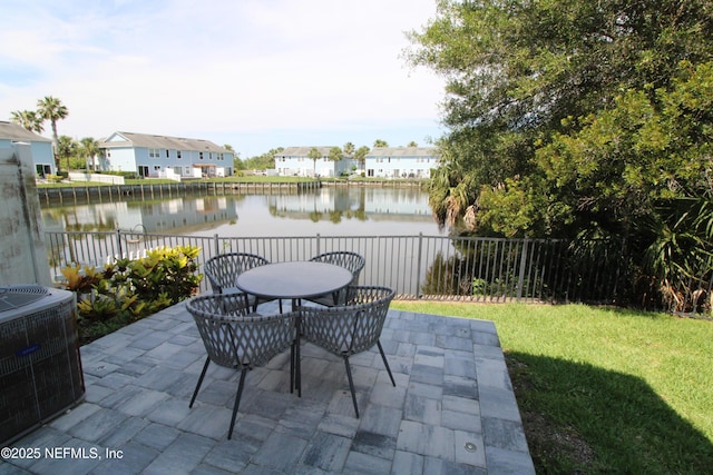 58 Islander Cir, Saint Augustine, FL 32080 - view of patio / terrace with cooling unit, a water view, a residential view, and outdoor dining area