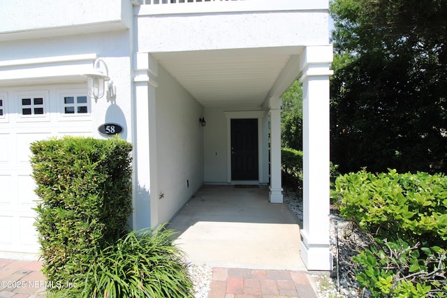 58 Islander Cir, Saint Augustine, FL 32080 - property entrance featuring stucco siding