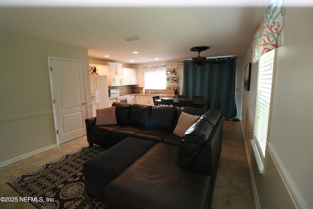 58 Islander Cir, Saint Augustine, FL 32080 - living room featuring baseboards, light tile patterned floors, and recessed lighting