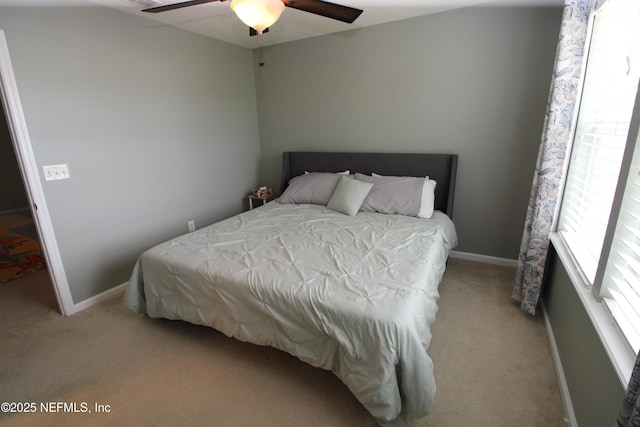58 Islander Cir, Saint Augustine, FL 32080 - bedroom with carpet floors, baseboards, and ceiling fan
