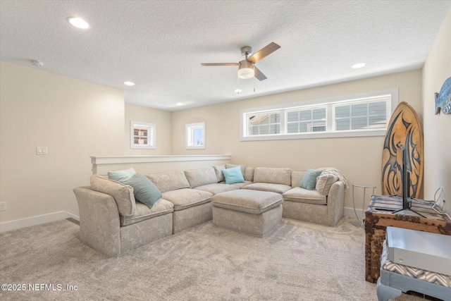 125 5th St, Saint Augustine, FL 32080 - carpeted living room with a ceiling fan, a textured ceiling, recessed lighting, and baseboards