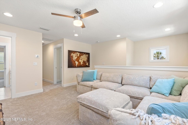 125 5th St, Saint Augustine, FL 32080 - carpeted living area with ceiling fan, recessed lighting, a textured ceiling, and baseboards