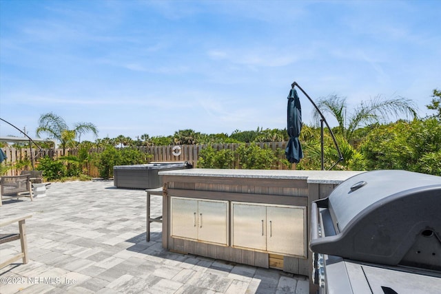 125 5th St, Saint Augustine, FL 32080 - view of patio / terrace featuring a grill
