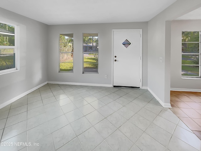 2926 Hunt St, Jacksonville, FL 32254 - entrance foyer featuring light tile patterned flooring and baseboards