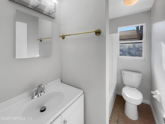 2926 Hunt St, Jacksonville, FL 32254 - full bathroom with toilet, vanity, tile patterned flooring, and baseboards