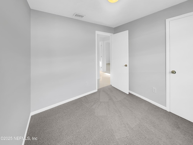 2926 Hunt St, Jacksonville, FL 32254 - unfurnished bedroom featuring baseboards and carpet flooring