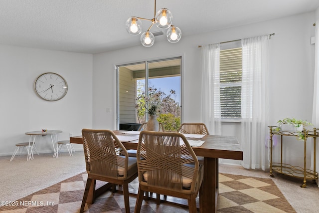 1305 Panther Lk Parkway, Jacksonville, FL 32221 - dining room featuring light colored carpet, a chandelier, and baseboards