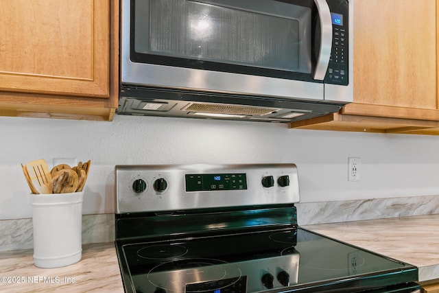 1305 Panther Lk Parkway, Jacksonville, FL 32221 - kitchen view of appliances with stainless steel finishes and light countertops