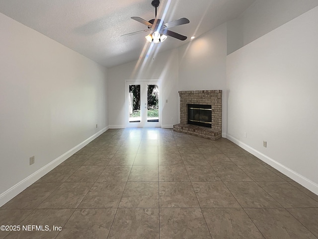 624 Staffordshire Dr, Jacksonville, FL 32225 - unfurnished living room featuring tile patterned floors, a ceiling fan, a brick fireplace, baseboards, and a textured ceiling