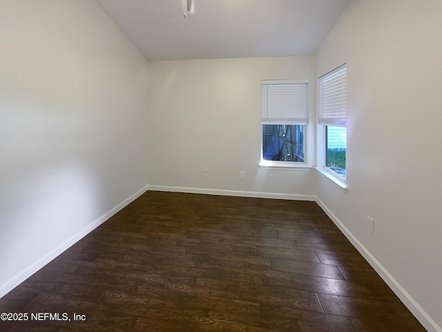 624 Staffordshire Dr, Jacksonville, FL 32225 - spare room with dark wood finished floors and baseboards