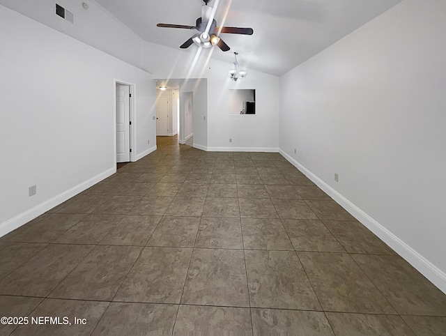 624 Staffordshire Dr, Jacksonville, FL 32225 - spare room with lofted ceiling, ceiling fan, tile patterned flooring, and baseboards
