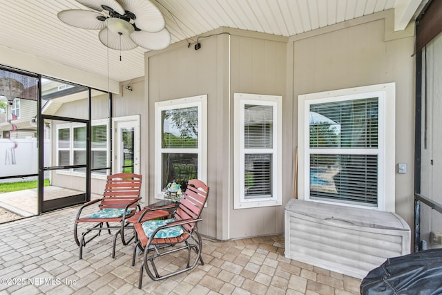 104 Twin Lakes Dr, Saint Augustine, FL 32084 - sunroom with a ceiling fan
