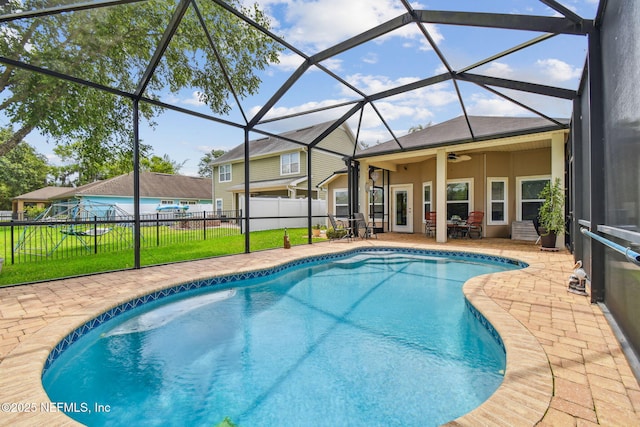 104 Twin Lakes Dr, Saint Augustine, FL 32084 - view of pool featuring a patio area, a ceiling fan, and glass enclosure