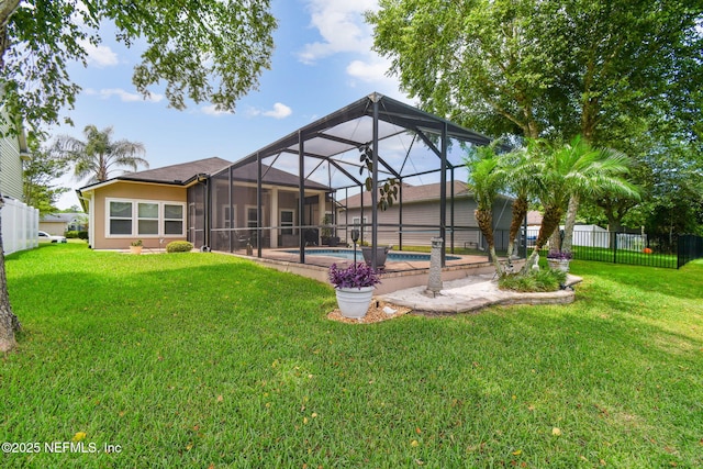 104 Twin Lakes Dr, Saint Augustine, FL 32084 - rear view of property featuring glass enclosure