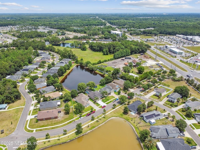104 Twin Lakes Dr, Saint Augustine, FL 32084 - aerial overview of property's location with a nearby body of water and a forest
