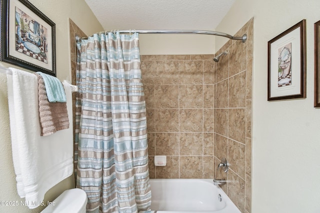 104 Twin Lakes Dr, Saint Augustine, FL 32084 - full bathroom with shower / tub combo with curtain, toilet, and a textured ceiling