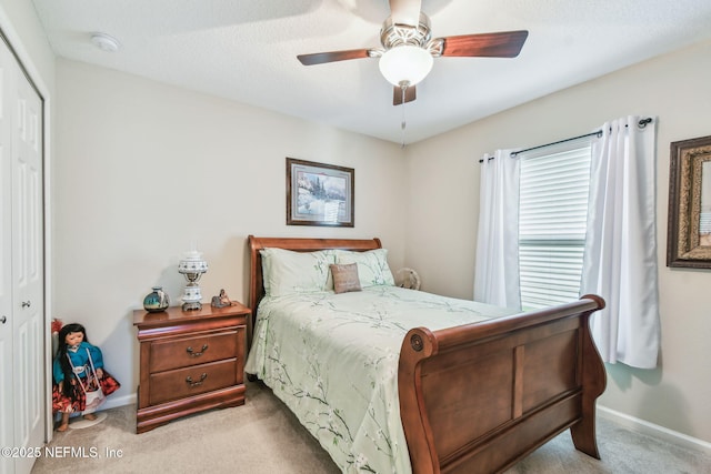 104 Twin Lakes Dr, Saint Augustine, FL 32084 - bedroom featuring carpet flooring, a closet, baseboards, and ceiling fan