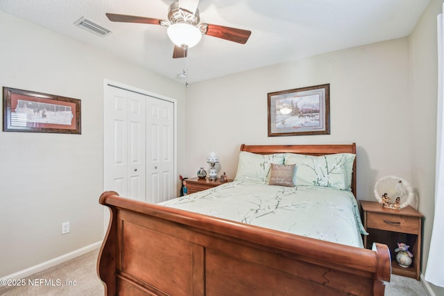 104 Twin Lakes Dr, Saint Augustine, FL 32084 - bedroom with light colored carpet, a closet, baseboards, and ceiling fan