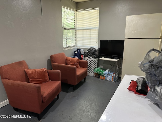 3856 Spring Park Rd, Jacksonville, FL 32207 - living area featuring concrete flooring