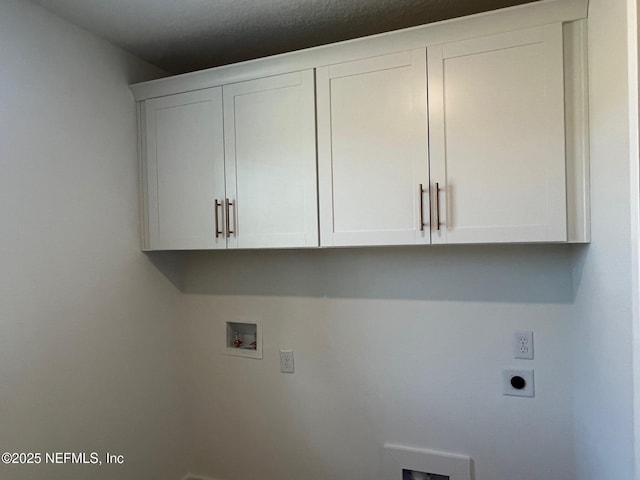 96124 Pirates Bluff Rd, Yulee, FL 32097 - laundry room featuring cabinet space, hookup for an electric dryer, and washer hookup