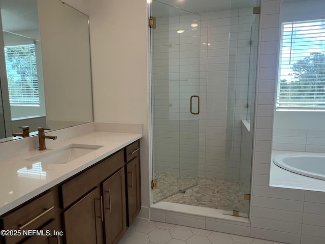 96124 Pirates Bluff Rd, Yulee, FL 32097 - bathroom with vanity, a shower stall, tile patterned floors, and a garden tub