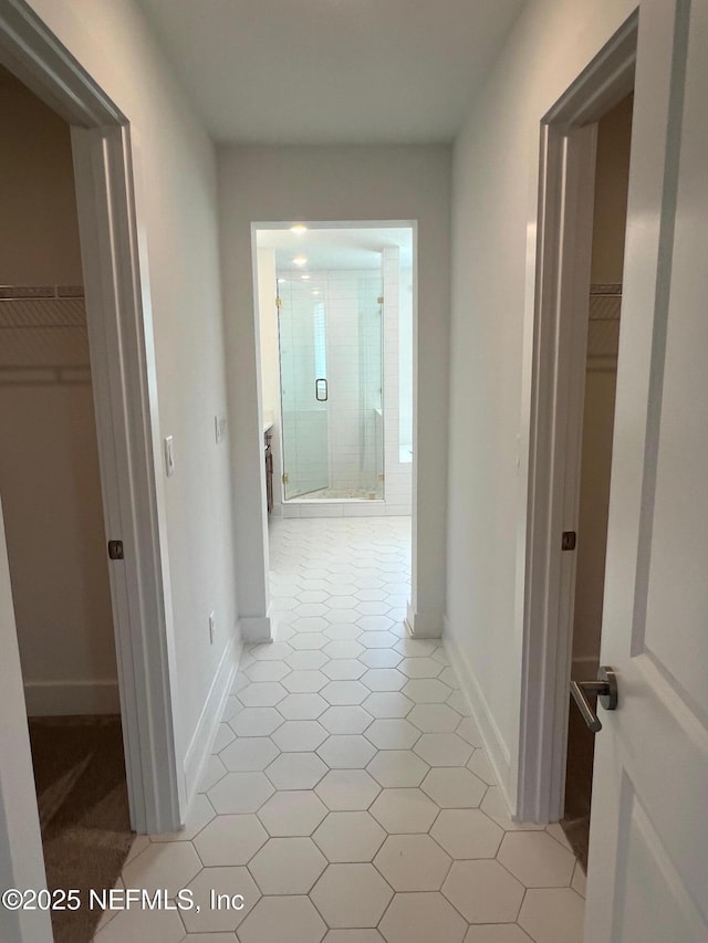 96124 Pirates Bluff Rd, Yulee, FL 32097 - corridor featuring light flooring and baseboards