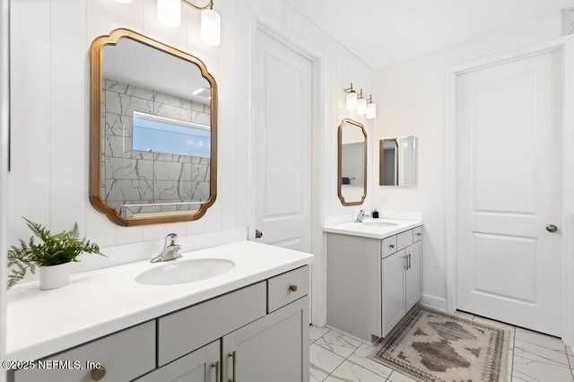 9789 Intellect Trl, Jacksonville, FL 32256 - full bath with marble look tile flooring and two vanities