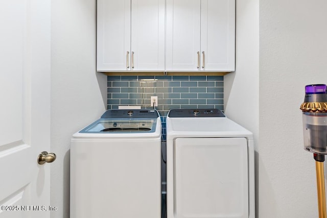 9789 Intellect Trl, Jacksonville, FL 32256 - laundry area with cabinet space and washer and clothes dryer