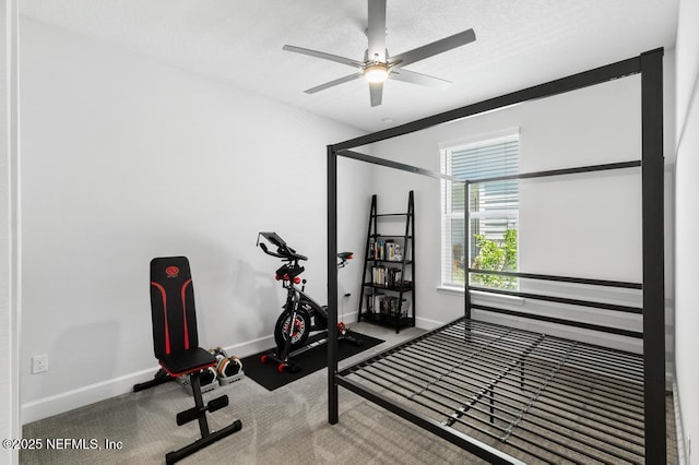 9789 Intellect Trl, Jacksonville, FL 32256 - exercise room with baseboards, a ceiling fan, and carpet flooring