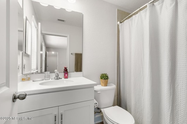 9789 Intellect Trl, Jacksonville, FL 32256 - bathroom with vanity, toilet, and a shower with shower curtain