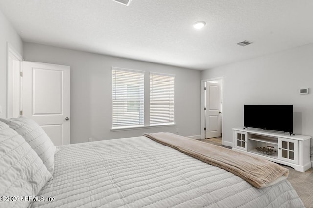 9789 Intellect Trl, Jacksonville, FL 32256 - bedroom with baseboards and light colored carpet