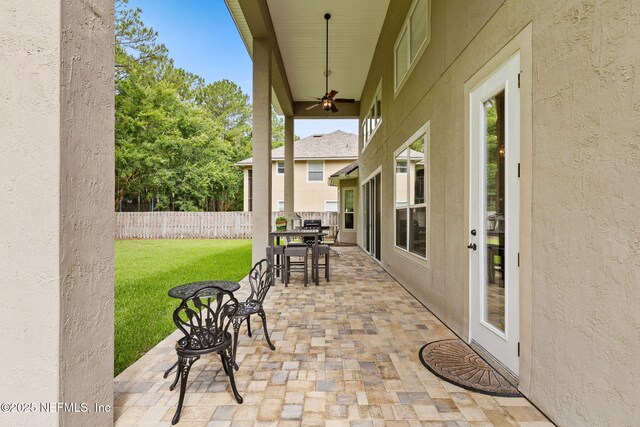 1159 Eastwood Branch Dr, Saint Johns, FL 32259 - view of patio with a ceiling fan and outdoor dining space