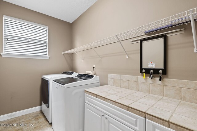 1159 Eastwood Branch Dr, Saint Johns, FL 32259 - laundry area featuring washing machine and clothes dryer and baseboards