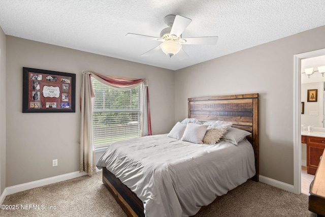 1159 Eastwood Branch Dr, Saint Johns, FL 32259 - bedroom featuring carpet floors, a textured ceiling, baseboards, connected bathroom, and ceiling fan