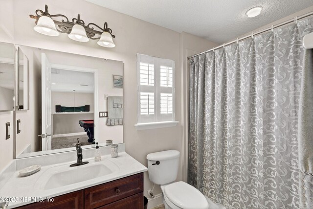 1159 Eastwood Branch Dr, Saint Johns, FL 32259 - full bath featuring toilet, vanity, a textured ceiling, and a shower with curtain