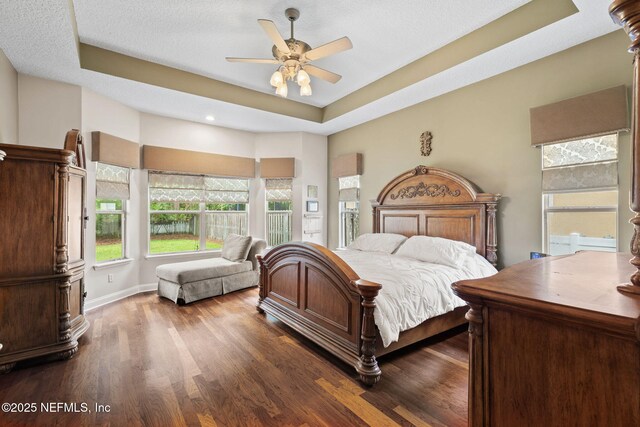 1159 Eastwood Branch Dr, Saint Johns, FL 32259 - bedroom with wood finished floors, a tray ceiling, a ceiling fan, baseboards, and recessed lighting