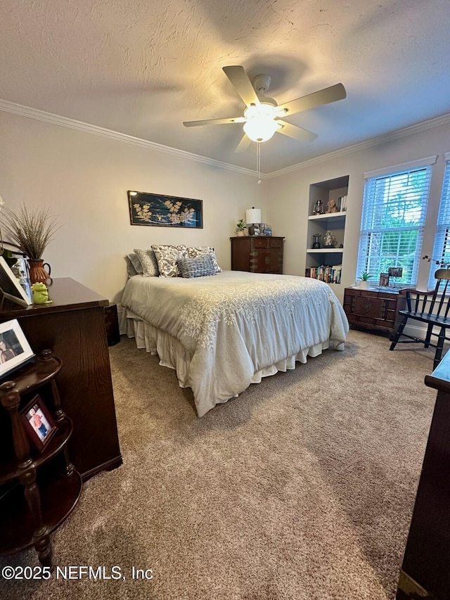 4026 Corrientes Ct E, Jacksonville, FL 32217 - carpeted bedroom with crown molding, a textured ceiling, and ceiling fan