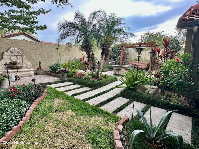 4026 Corrientes Ct E, Jacksonville, FL 32217 - view of yard with a patio