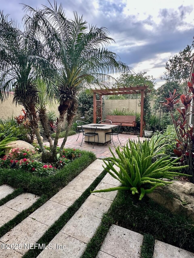 4026 Corrientes Ct E, Jacksonville, FL 32217 - view of yard with a pergola and a patio