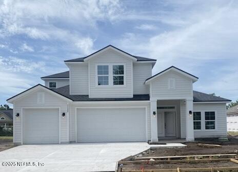 96088 Pirates Bluff Rd, Yulee, FL 32097 - view of front of home with concrete driveway and an attached garage