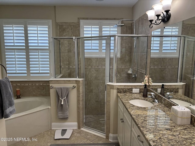 501 N Legacy Trl, Saint Augustine, FL 32092 - full bathroom featuring tile patterned floors, a stall shower, vanity, and a bath