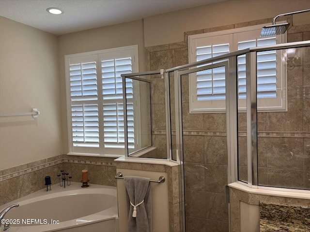 501 N Legacy Trl, Saint Augustine, FL 32092 - bathroom featuring a bath and a shower stall
