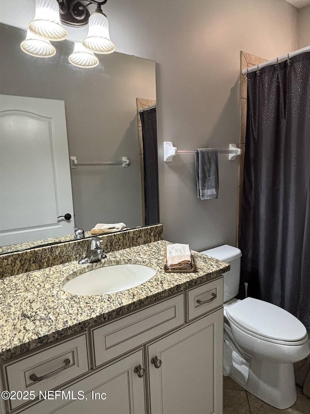 501 N Legacy Trl, Saint Augustine, FL 32092 - full bathroom with vanity, toilet, tile patterned floors, and curtained shower