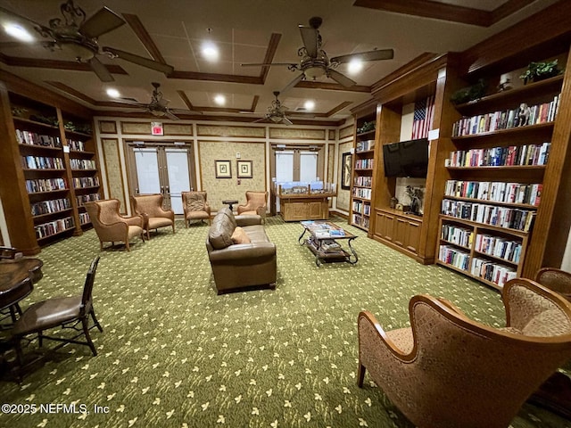 501 N Legacy Trl, Saint Augustine, FL 32092 - sitting room with ceiling fan, wall of books, carpet, and plenty of natural light