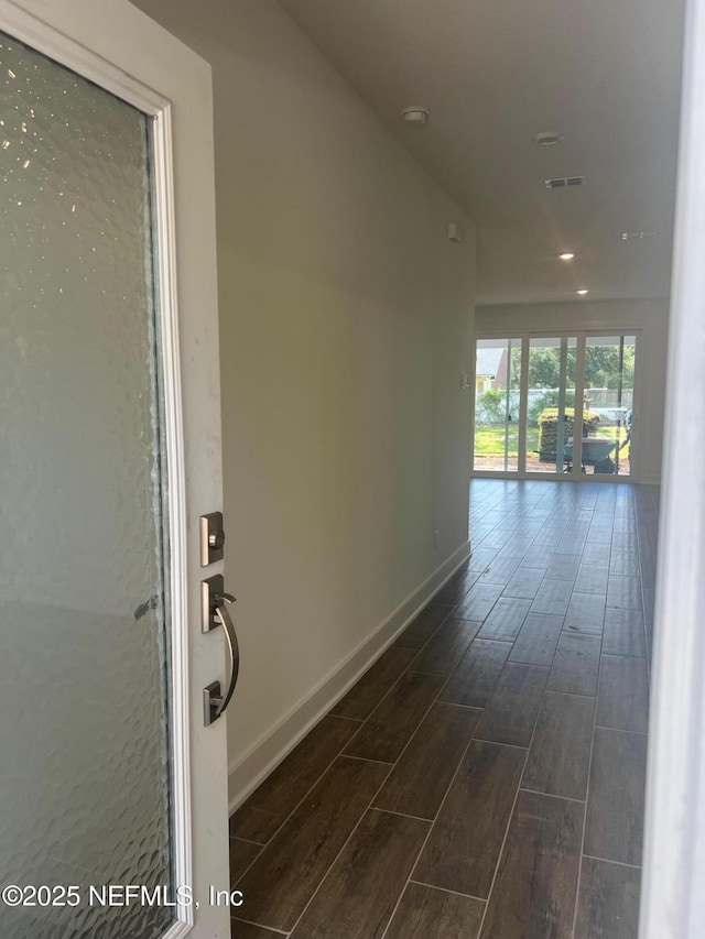 96100 Pirates Bluff Rd, Yulee, FL 32097 - hallway featuring dark wood-type flooring and recessed lighting
